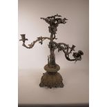 A C19th silver plated table centrepiece with three candle sconce and trailing oak leaf and acorn