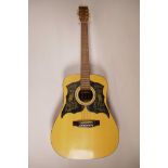 A vintage 'K' acoustic guitar, 40" long