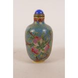 A Chinese cloisonné snuff bottle with peach tree and bat decoration, 3" high