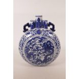A Chinese blue and white porcelain triple stem moon flask with two handles, decorated with a