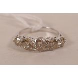 An 18ct white gold five stone graduated diamond ring, approximately 1.94cts, approximate size 'O'