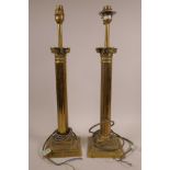 A pair of Corinthian column brass lamps, 19" high x 5" wide