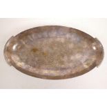 A Continental silver plated oval dish with a hammered finish, maker's mark to base and inscription