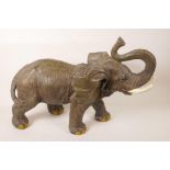 A composition figurine of an African elephant, 14" high