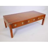 A campaign style hardwood occasional table with three true and three dummy drawers, with sunken