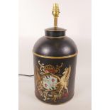 A metal table lamp in the form of a toleware churn and cover painted with a coat of arms, 18" high