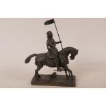 A detailed bronze figurine of Joan of Arc on horseback, 7" long