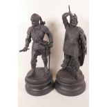 A pair of spelter figures of soldiers in armour, on turned wooden bases, 14" high