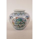 A Chinese doucai porcelain pot with dragon decoration, 6 character mark to base, 5" high