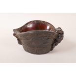 A Chinese faux horn libation cup with carved stylised decoration, impressed mark to base, 4½" x 5½"