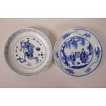 A Chinese blue and white porcelain saucer decorated with a mythical creature and another decorated