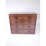 An early C19th mahogany chest of two over three cockbeaded drawers, with turned handles, A/F lacks