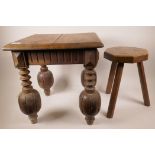 A C19th Jacobean style oak table, with plain top (cracked), and decorative turned and carved legs,