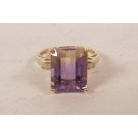 A 14 carat yellow gold dress ring set with a large ametrine with diamond shoulders, approximate size