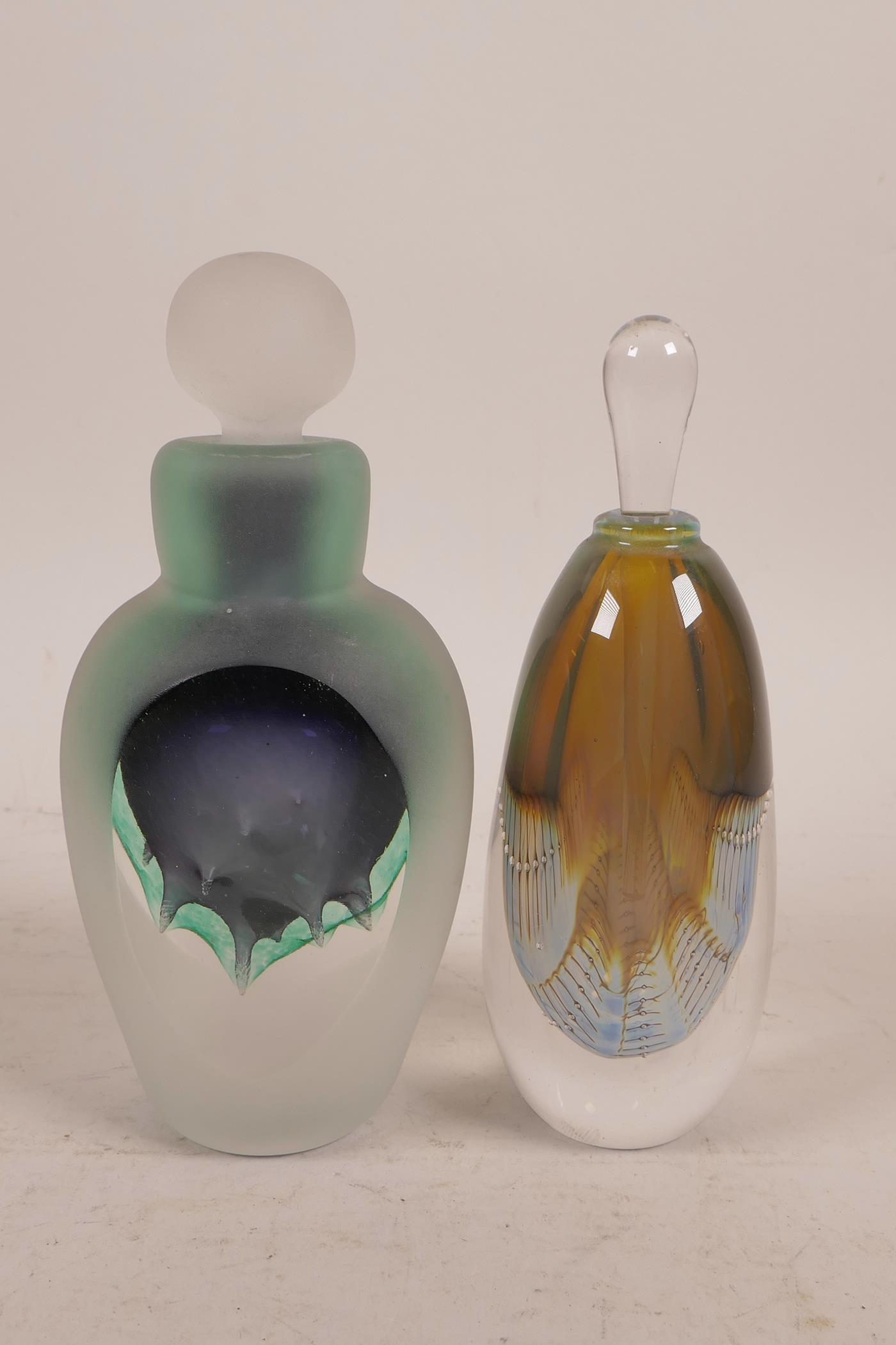 Two art glass perfume bottles with signature to base, largest 5½" high