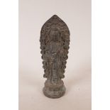 A Chinese bronze of Quan Yin standing on a lotus throne, 7" high