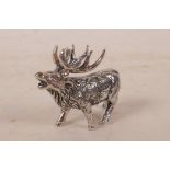 A sterling silver figure of a stag, 1½" long