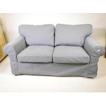 An Ikea 'Ektorp' two seat sofa in 'Nordvalla dark grey', 70" wide x 29" high