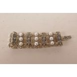 A silver, marcasite and freshwater pearl set bracelet, 7" long
