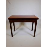 A Georgian mahogany fold over card table with cantilever back leg movement, 36" x 18", 28½" high