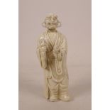 A Chinese blanc de chine figure of Lohan, impressed marks verso, 7" high