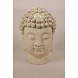 A Chinese blanc de chine Buddha head, 10½" high