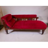 An Edwardian oak show frame chaise longue with classical carved decoration, 70" x 28", 31" long