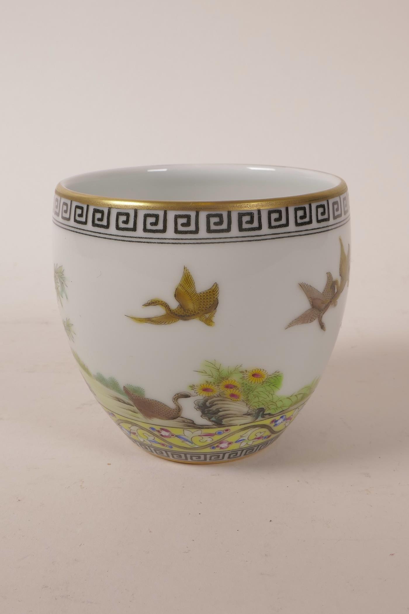 A Chinese polychrome porcelain tea bowl decorated with ducks and flowers, 4 character mark to - Image 2 of 5