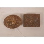 Two Indian copper belt buckles decorated with Hindu deities, 3" x 2½" largest