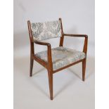 A mid century teak open armchair, 31" high