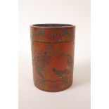 A Chinese red ground lacquer brush pot with engraved and painted decoration of chickens and