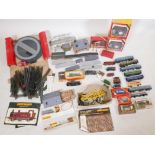 A quantity of Hornby OO gauge, including engines, rolling stock, tracks, scenery, a turn table etc