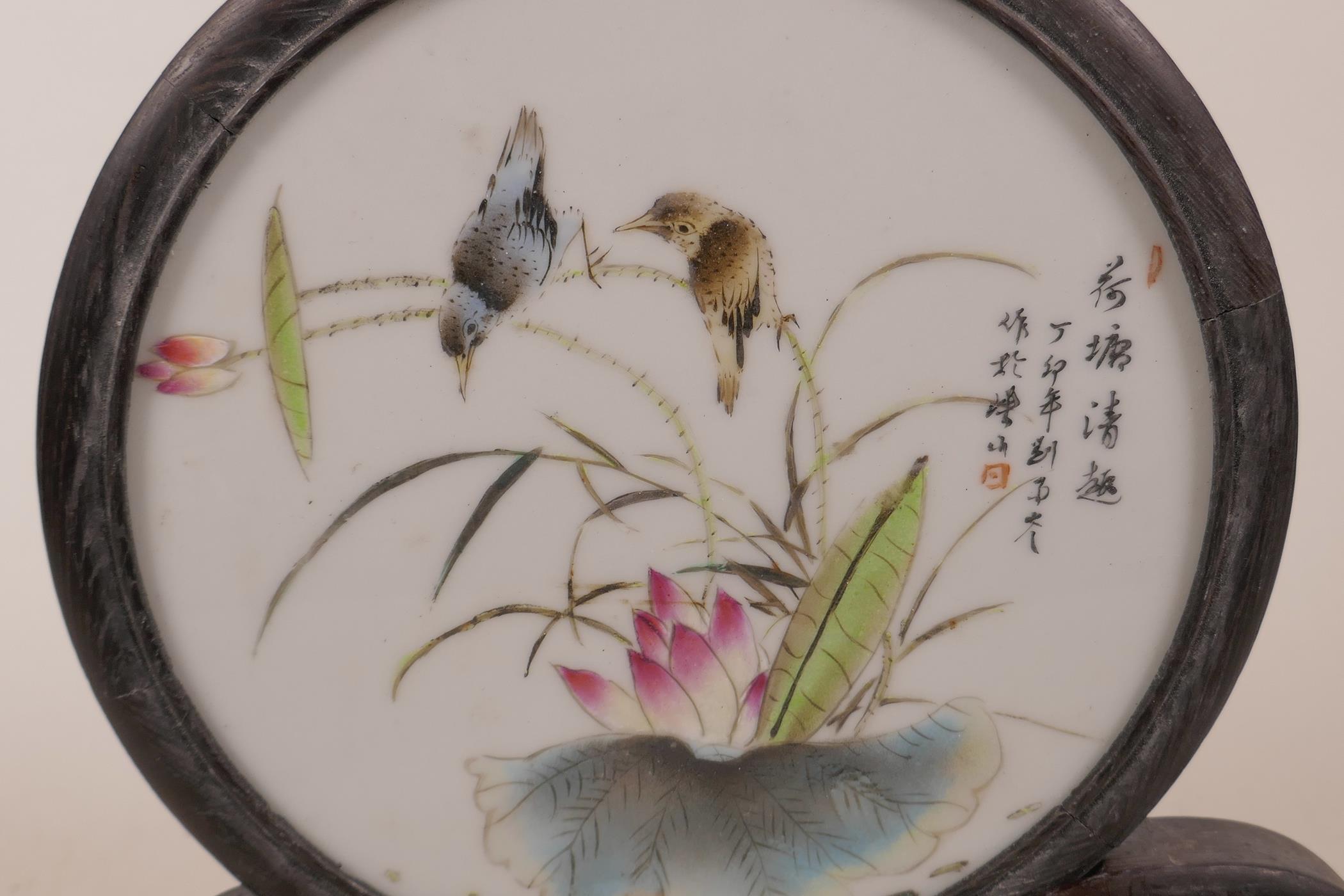 A Chinese polychrome porcelain and hardwood table screen, decorated with birds and a lotus flower, - Image 2 of 3