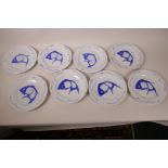 A set of eight Oriental blue and white porcelain side plates decorated with fish, 8" diameter