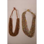 A multi strand agate bead necklace, together with a multi strand coloured glass necklace, 22" long