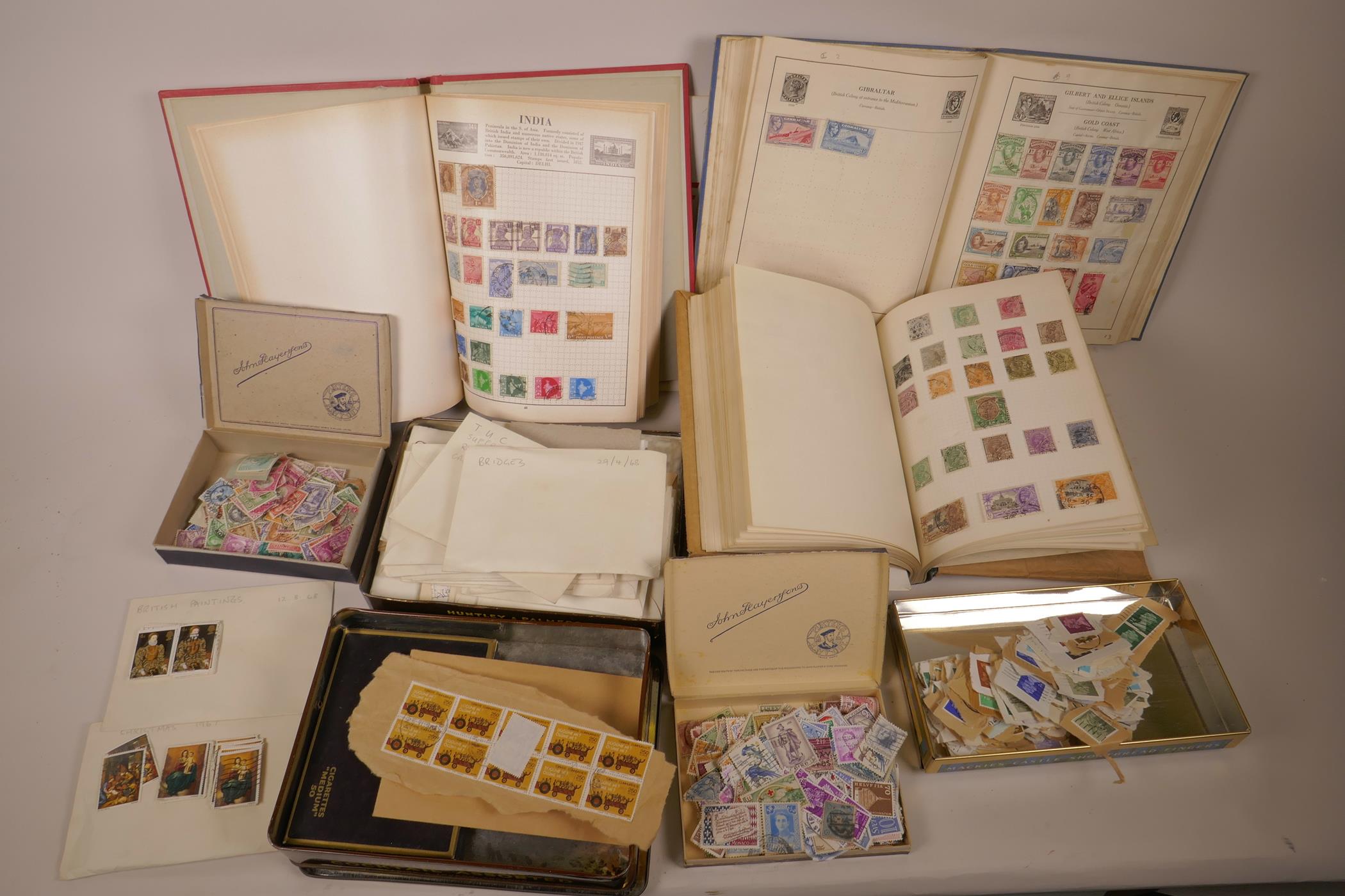 A large quantity of loose stamps and stamp albums, mostly Great Britain and empire