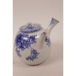 An oriental blue and white porcelain teapot decorated with flowering branches, 5½ high