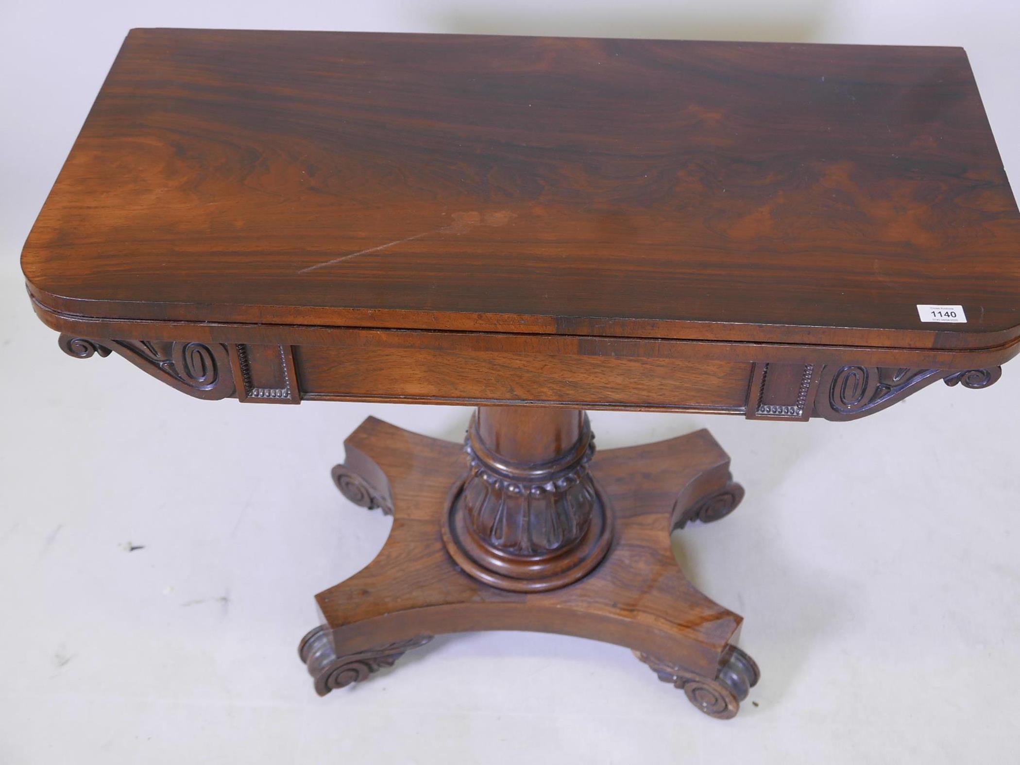 A William IV overgrained rosewood fold over card table, with inset baize top, raised on carved - Image 2 of 7