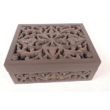 A pierced and carved wood box, 10" x 8" x 4"