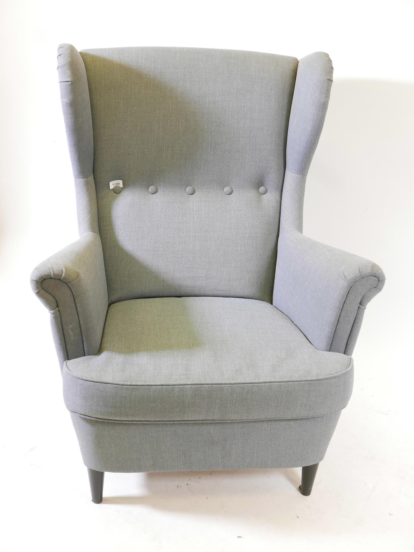 An Ikea 'Strandmon' wing back armchair, covered in 'Nordvalla dark grey', 41" high - Image 2 of 2