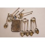 A hallmarked silver cigarette case together with a set of six hallmarked silver teaspoons, gross