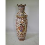 A large Chinese ceramic floor vase, with gilt phoenix handles and polychrome decoration, 62" high