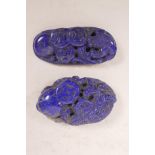 A Chinese lapiz lazuli pendant with carved Chan Chu decoration, and another similar, 2" long