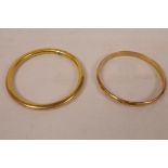 A 9ct gold hollow bangle, 11.5g, together with a rolled gold hollow bangle