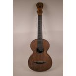 A small Russian made accoustic seven string guitar with mother of pearl inlaid decoration, A/F split