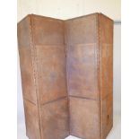 A late C19th/early C20th leather three fold screen, each leaf 21" x 79"