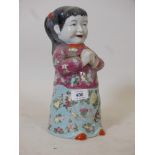 A Chinese ceramic figure with enamel glaze, 12" high