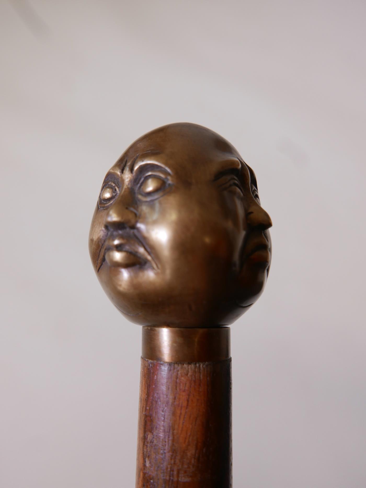 A hardwood walking stick with brass four-face Buddha head handle, 36" long - Image 4 of 4