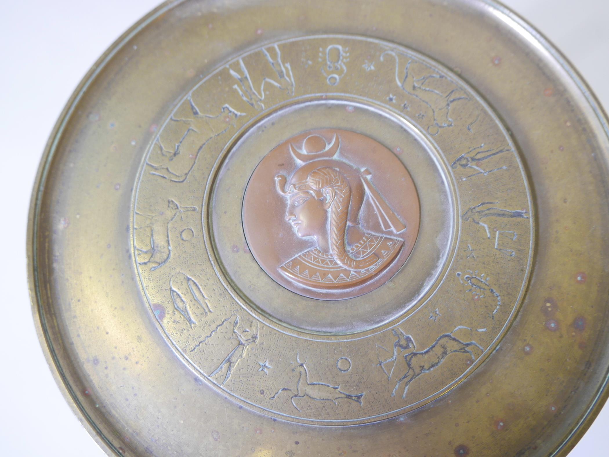 A French Art Deco brass and copper tazza, the top with engraved zodiac figures and a central - Image 4 of 6