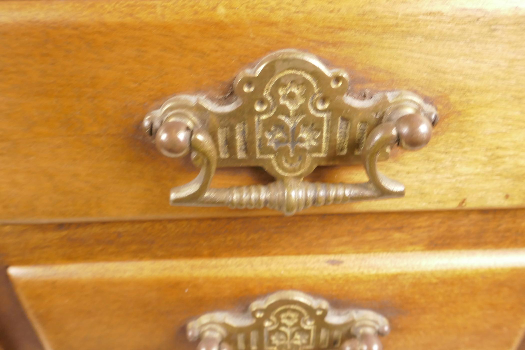 A small hardwood chest of four short over 4 long drawers with brass drop handles, 19" x 16" x 11" - Image 4 of 4